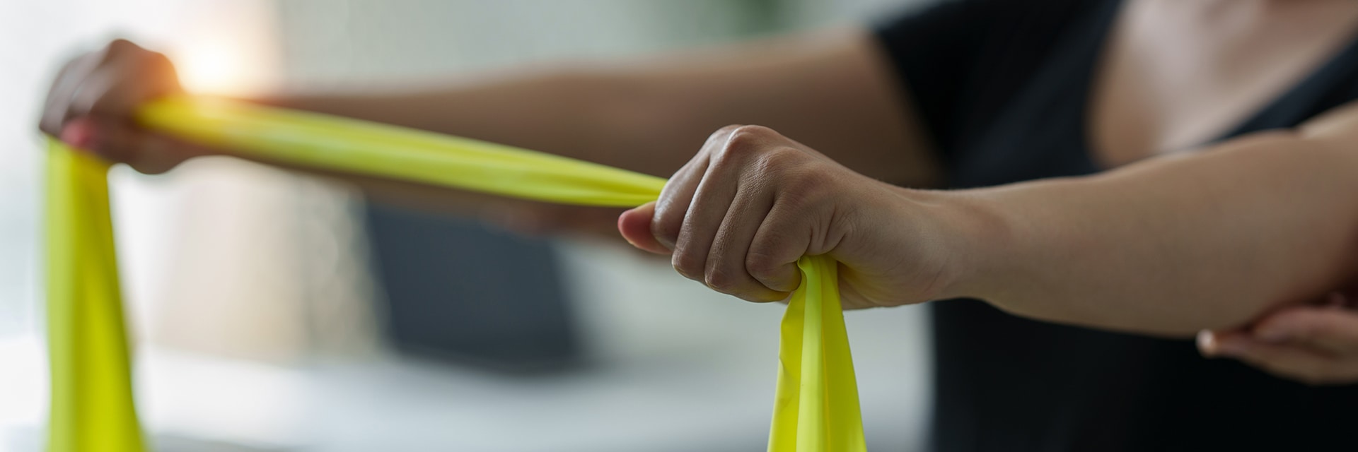 women using stretching bands