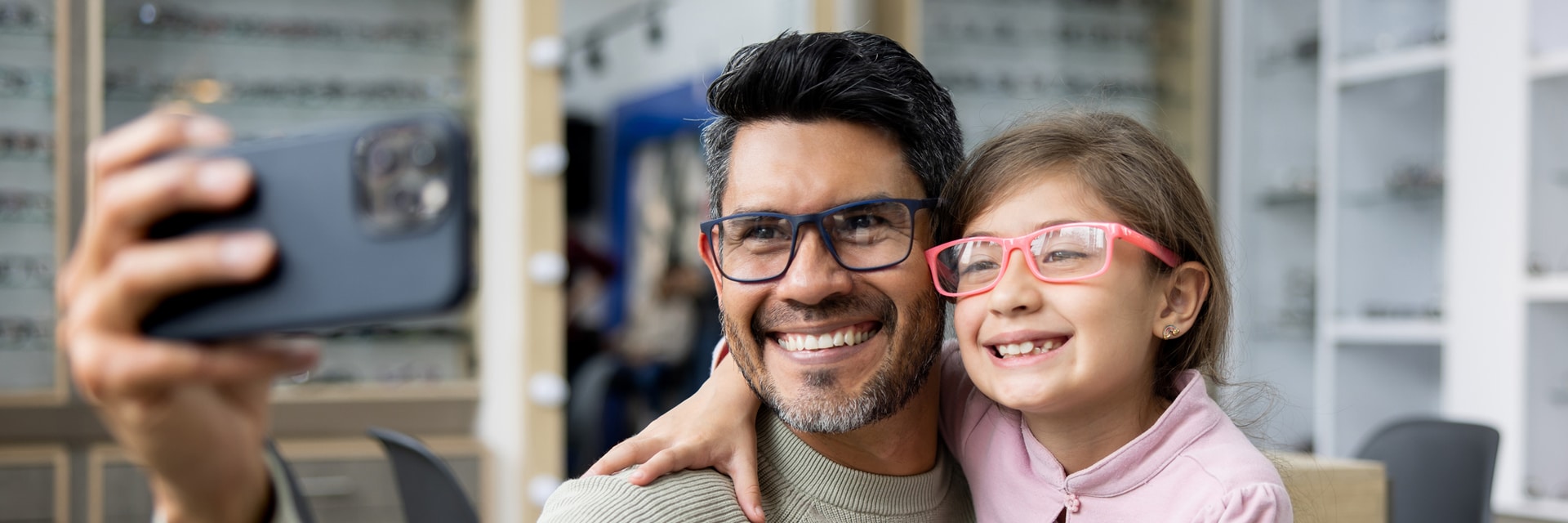 dad and daughter taking selfie