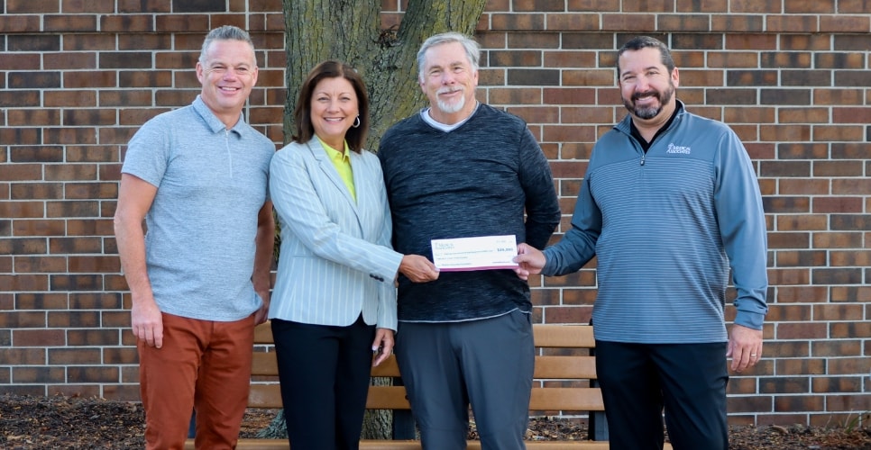 Pictured Left to Right: Timothy King, MD, Bobbi Earles with the Community Foundation of Greater Dubuque, Edward Alt, MD, and Zach Keeling, CEO of Medical Associates and Health Plans.