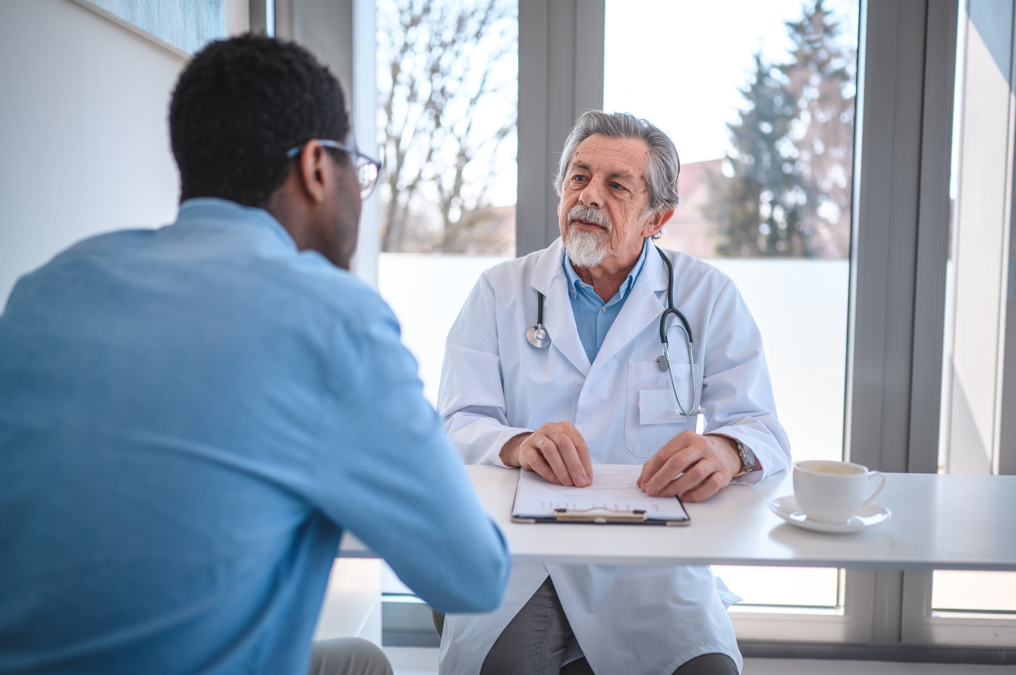 Doctor talking with patient