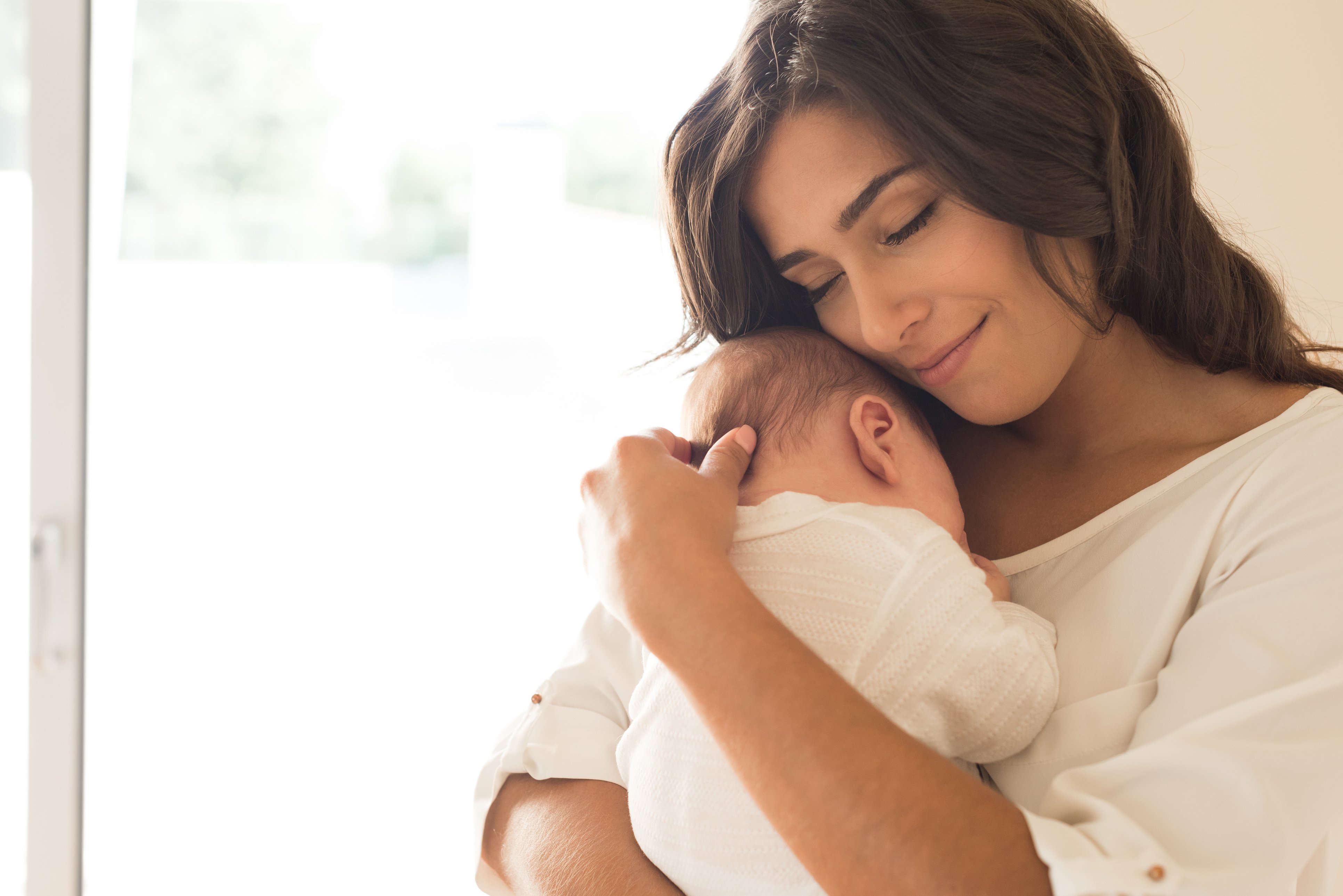 smiling mom with child