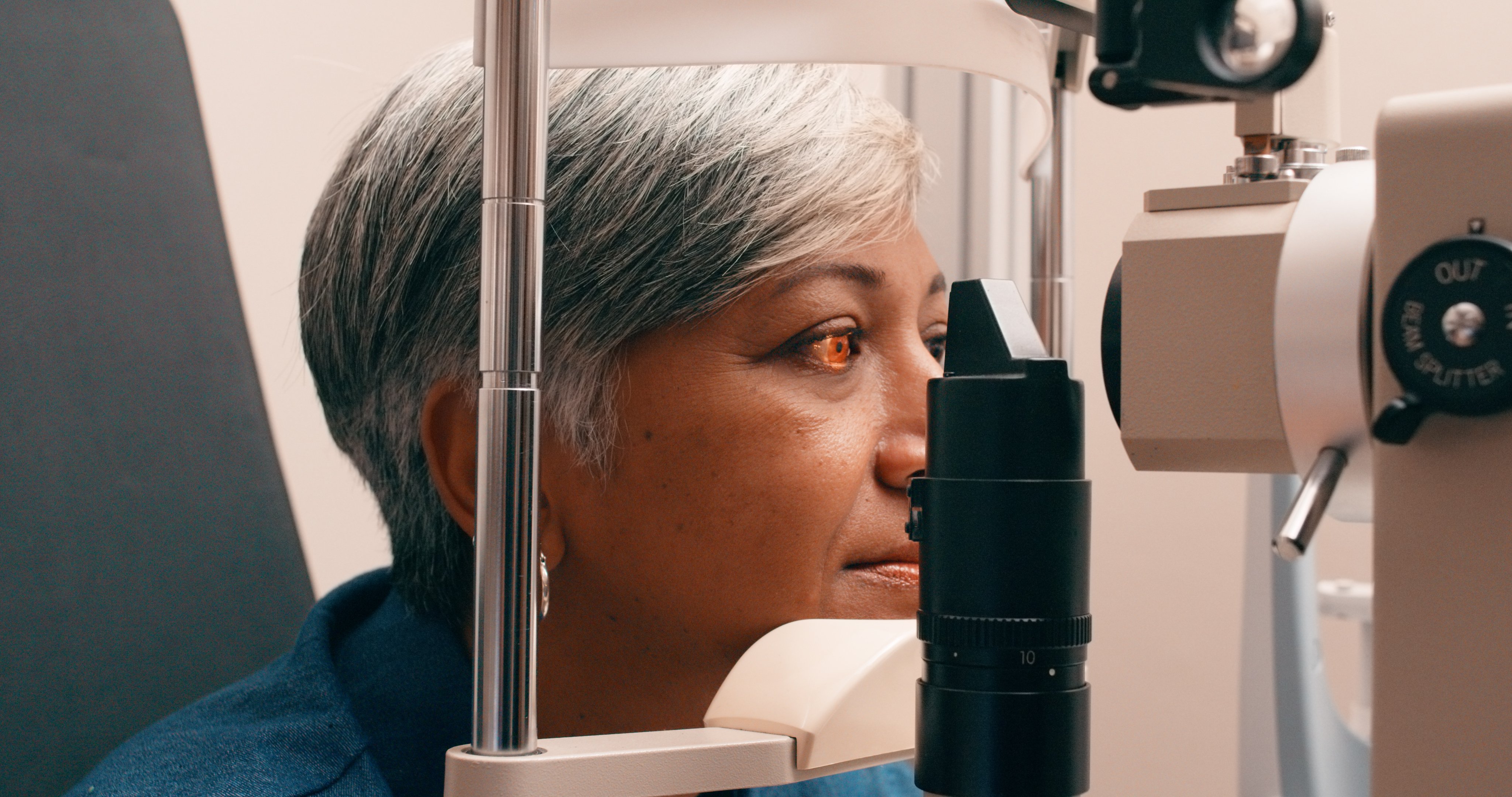 older woman getting eye exam