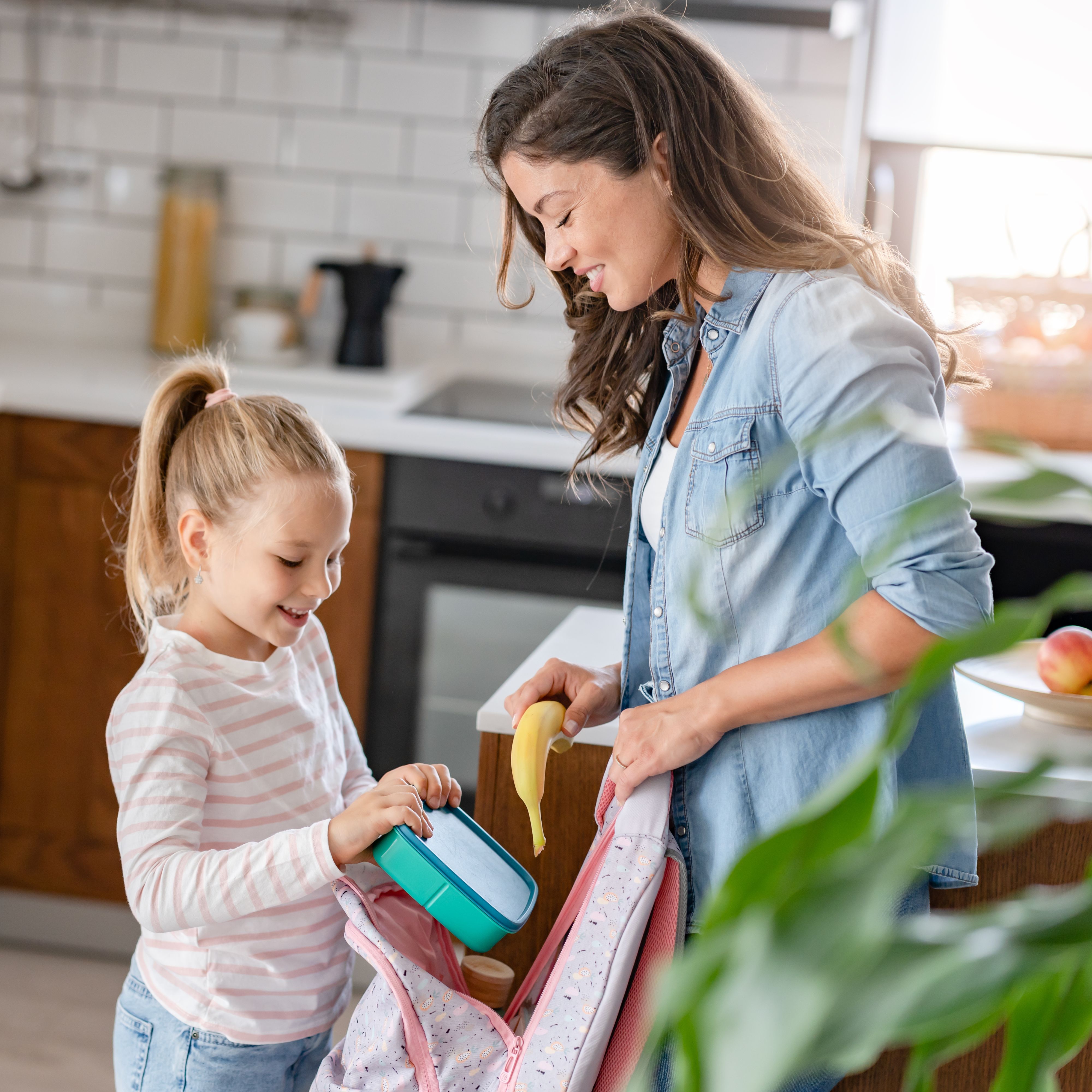 Mom and daughter prepping for school