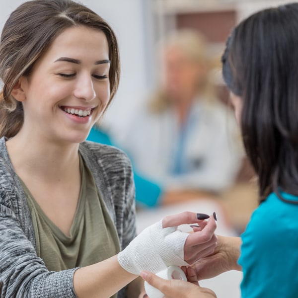 patient getting wrist wrapped